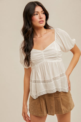 Delicate white top, women’s apparel
